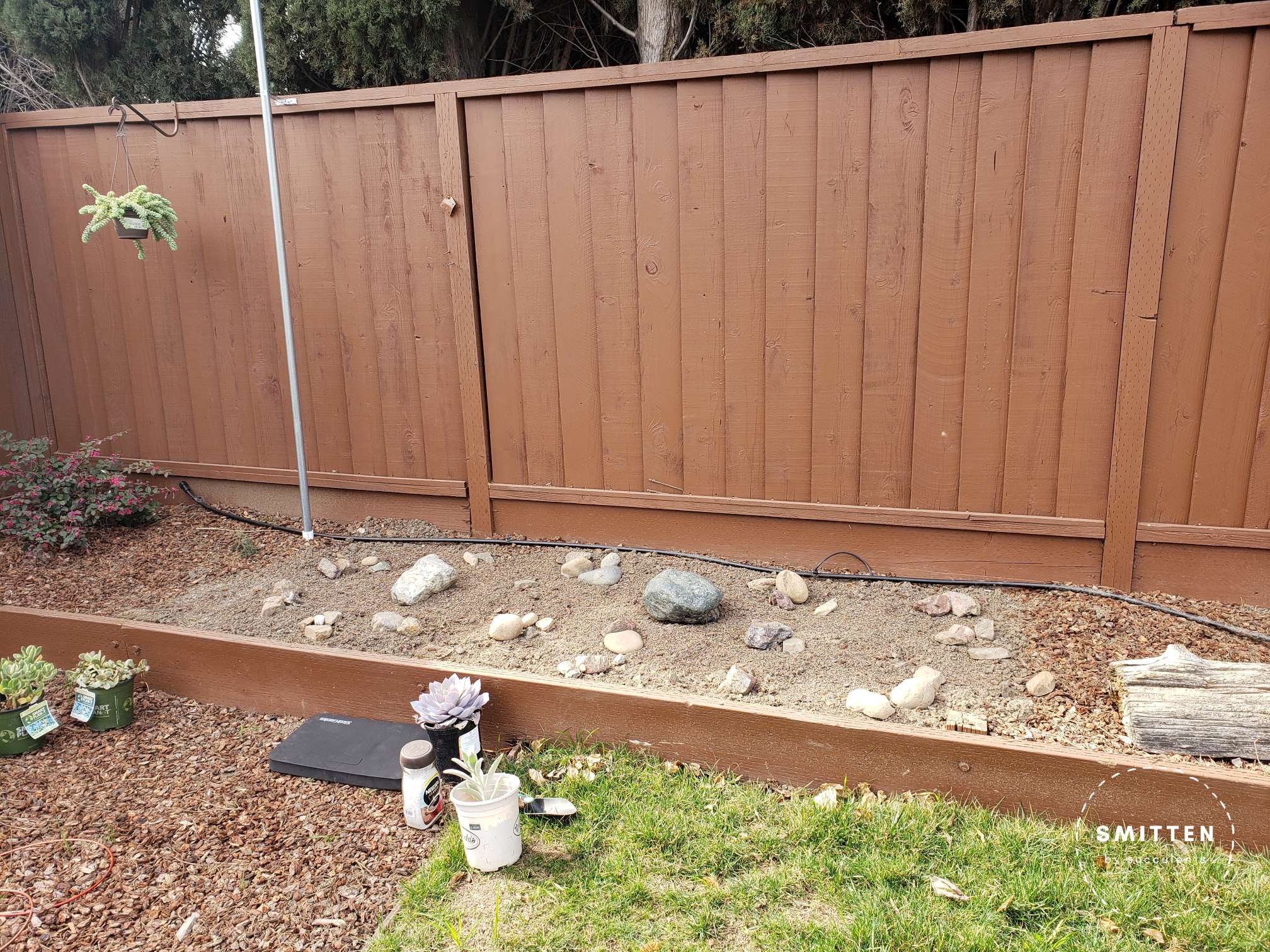 Garden bed with amendment and decorative rocks